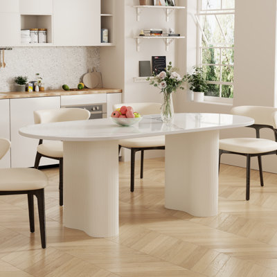 Table de salle à manger ovale moderne 71 "pour 6 personnes Jamani, plateau en pierre frittée blanc brillant, pieds en bois stables