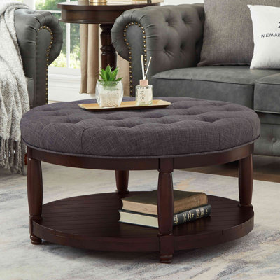 Grande table basse ronde avec repose-pieds rembourré en lin et grand repose-pieds avec rangement en bois