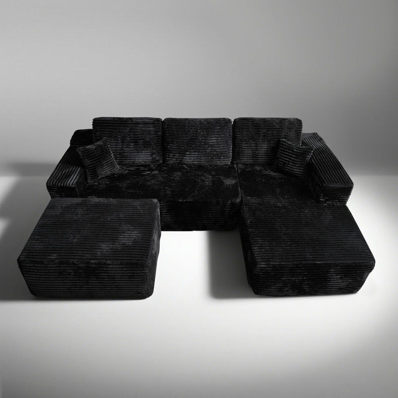 Canapé modulaire en forme de L de 106 po avec repose-pieds Seren Boneless, Similifourrure noire, Orienté à droite