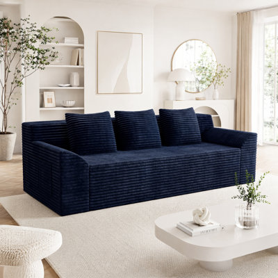 Canapé capitonné en nuage de velours côtelé avec assise profonde, coussins à deux couches