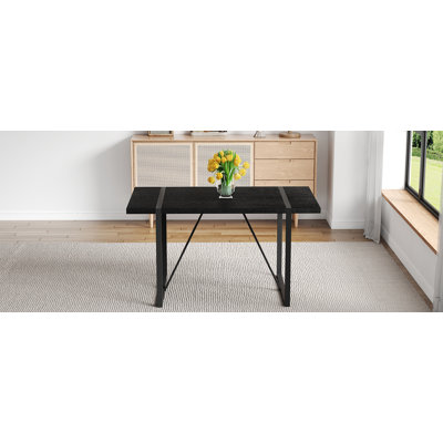 A 55-Inch minimalist retro rectangular dining table with a black textured top with Inset Rectangular Black Metal legs.Minimalist MDF Tabletop.Meeting
