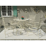 Akeyra 4 - Person Metal Patio Dining Set with Round Table