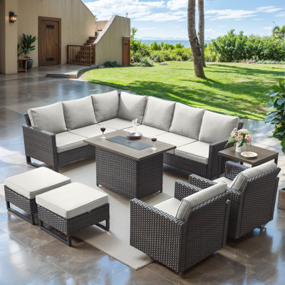 Hansencamp 9 - Person Outdoor Sectional Seating Group With Fire Pit With Swivel Glide Chair And Cushions by Latitude Run
