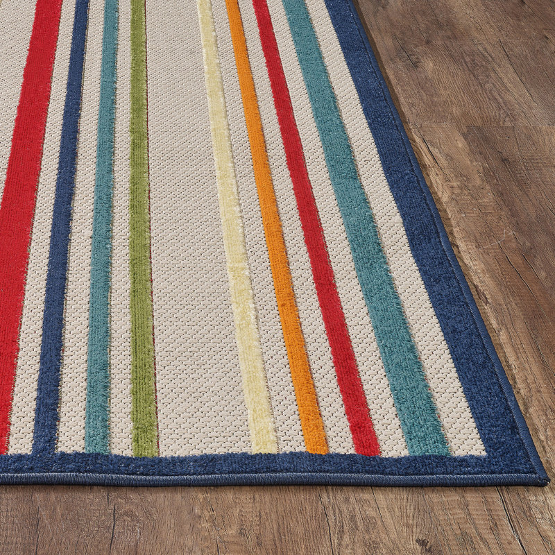 Tapis intérieur / extérieur rayé bleu et ivoire 2 pi x 4 pi résistant aux taches
