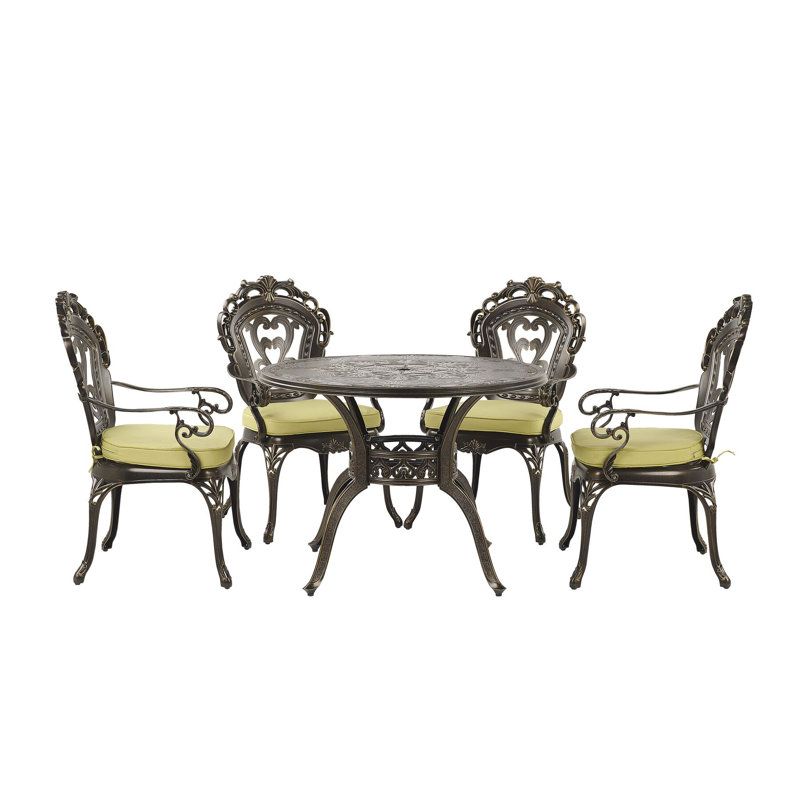 Fraire 4 - Person Patio Dining Set Umbrella Hole Included Round Table with Cushions Included