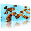 Ensemble de 3 tableaux sur toile tendue représentant des feuilles d'automne sur un ciel bleu-1998335009