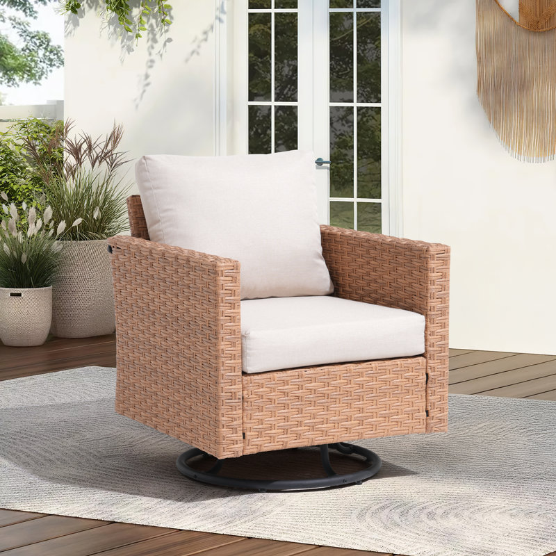 Chaise d'extérieur pivotante en rotin avec coussins