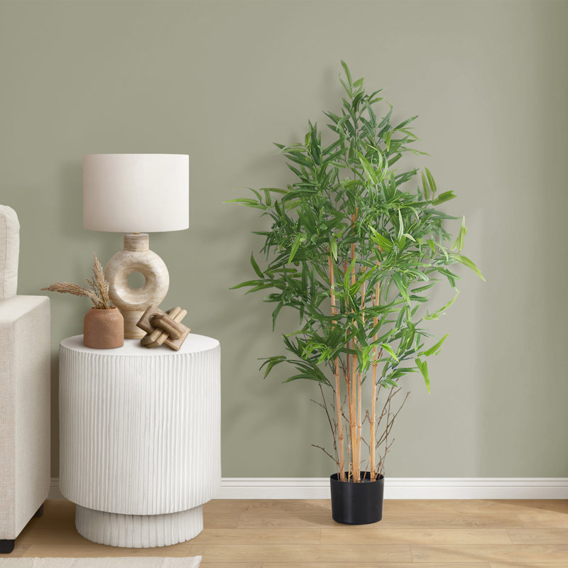 Bambou artificiel de 127 cm, plante décorative d'intérieur en pot noir, avec feuilles vertes.