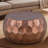 Round Hand-Hammered Coffee Table with Diamond-Patterned Base – Copper