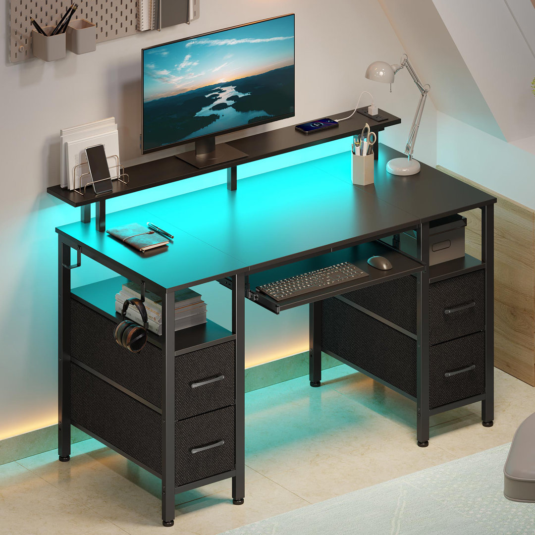 Computer Desk with 4 Drawers and Monitor Shelf, Gaming Desk with LED Lights & Power Outlets Wrought Studio™ 
