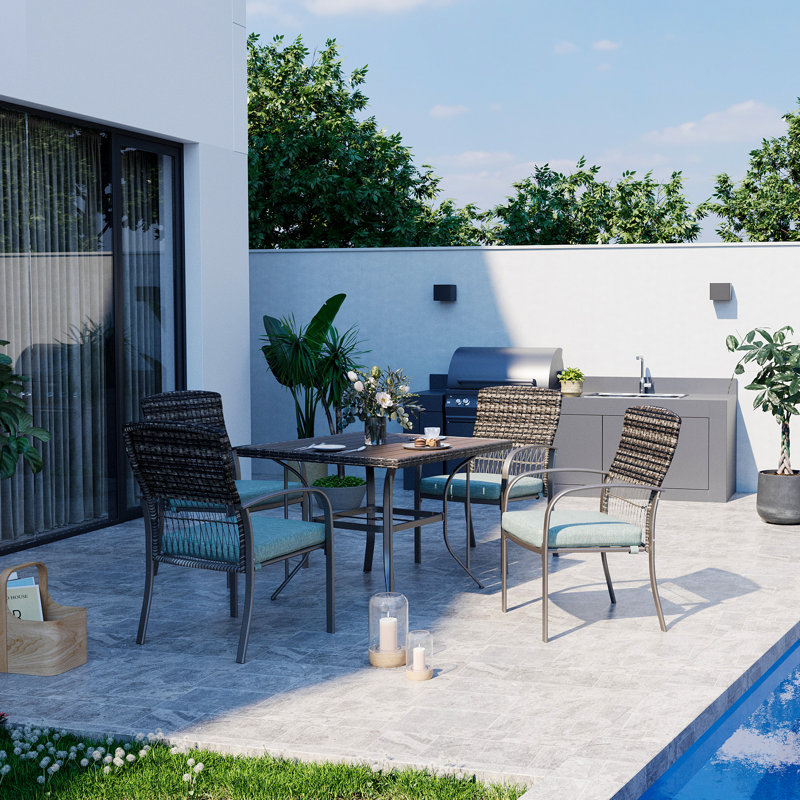 Hainer 4 - Person Wicker Patio Dining Set with Square Table , Cushions Included, Green