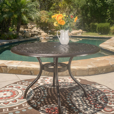 48-Inch Round Outdoor Dining Table Crafted Of Cast Aluminum In Hammered Bronze, With Tabletop, Umbrella Hole, And Curved Legs, For Entertaining 48-In Bronze Finish, Relaxing