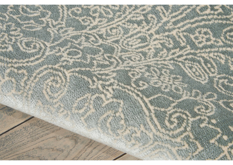 Platine Floral Area Rug in Marine/Beige
