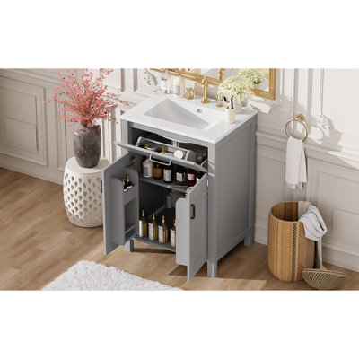 Meuble-lavabo de 24 po avec lavabo en céramique, rangement intelligent, cadre en bois massif, portes à fermeture en douceur et poignées en alliage d'aluminium pour une finition peinte exquise, rangement réglable, utilisation en noir