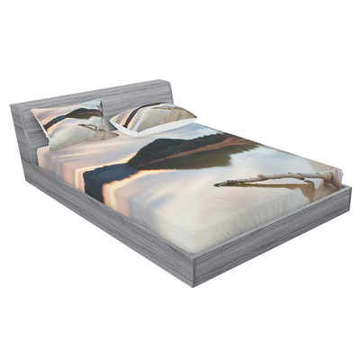 Landscape of Lake Shoreline with the Dead Tree Trunk in the Water Sheet Set