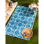 Tapis d'extérieur à treillis bleu et blanc Drusilla