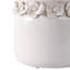 Pot de fleurs rond en céramique avec bordure florale sculptée et trou de drainage pour présentation décorative ou support pour plante-779790717