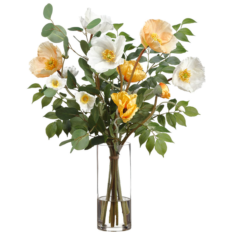 Arrangement de coquelicots dans un vase en verre crème jaune