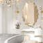 Miroir mural élégant et ovale ondulé-107728817-107728796