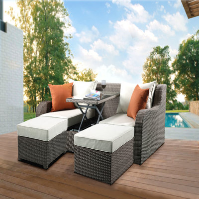 Canapé en osier beige et gris avec 2 coussins et 2 repose-pieds