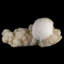 Un bouquet de mordénite sur Stilbite