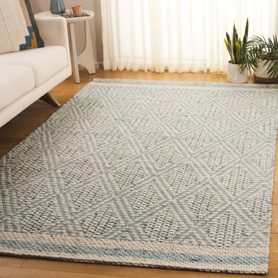 Tapis bleu / ivoire Marbella 576