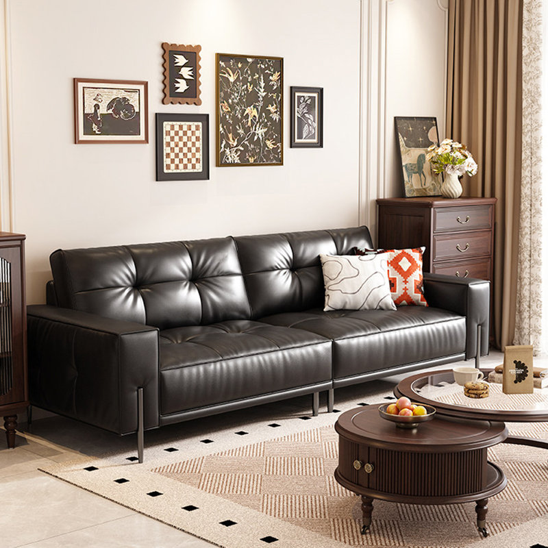 Causeuse-coussin modulable noire en cuir véritable