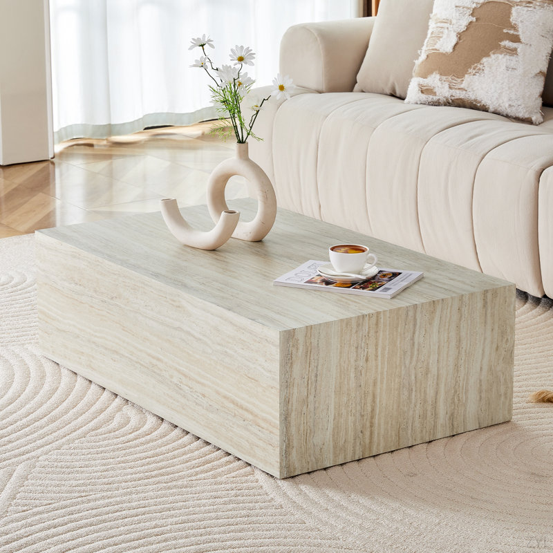 Rehaussez votre espace de vie avec cette table basse moderne en panneau de fibres à densité moyenne qui présente des motifs de texture de couleur bois clair et doux. Il est caractérisé par un design élégant. 39,3 * 23,6 * 11,8.