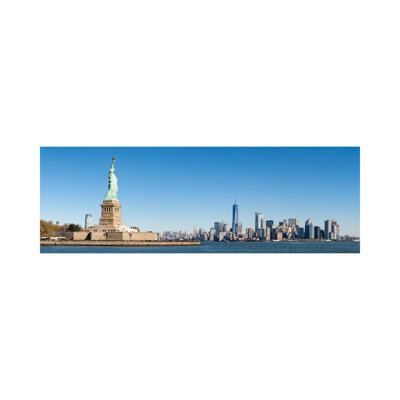Statue Of Liberty In Front Of The Manhattan Skyline by Jan Becke - Wrapped Canvas Panoramic Print