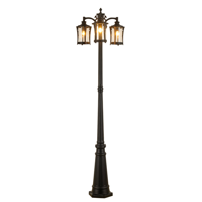 Lampadaire d'extérieur 3 lumières avec abat-jour en verre transparent Dusk to Dawn, structure en métal noir mat