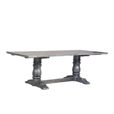 Table de salle à manger élégante à finition grise patinée avec plateau fixe rectangulaire et base stable en bois massif à double pilier