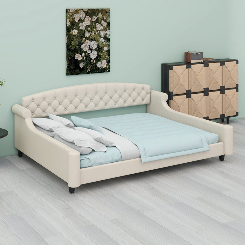 Canapé-lit avec capitonnage profond et construction durable pour les chambres d'amis ou les espaces de vie, Beige