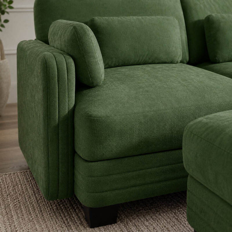 Canapé modulaire en L capitonné à 3 places avec repose-pieds mobile Channell, Vert