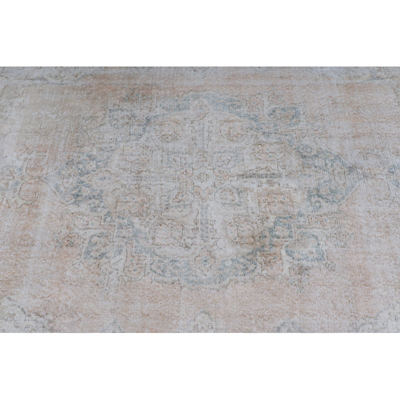 Tapis turc rétro de couleur pastel clair avec un motif délavé pour un décor de salon élégant et unique