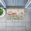 Tapis de porte d'extérieur imprimé A Day with Pink Flowers, design par Lanie Loreth, 18 po x 30 po