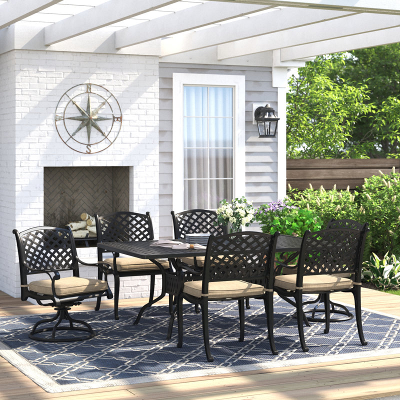 Ensemble repas de patio 7 pièces Frazee (avec 2 chaises berçantes pivotantes) avec coussins et table de salle à manger rectangulaire de 42 po x 72 po