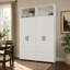 Armoire de rangement blanche de 63 po de largeur avec 4 portes et chariots à roulettes