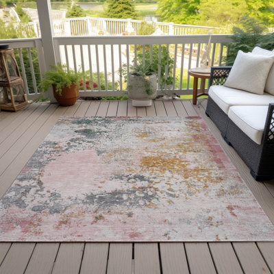 Tapis intérieur / extérieur rose lavable à la machine Xhevrie