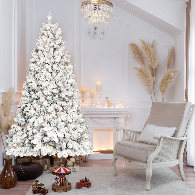 Arbre de Noël floqué avec lumières UL et pommes de pin naturelles - pointes en PVC enneigées, pointes, structure à charnières, support en métal stable, installation facile