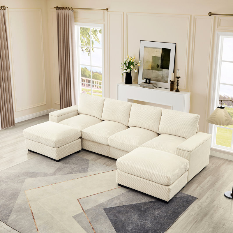 Canapé modulaire à assise profonde avec repose-pieds et canapé-lit en velours côtelé