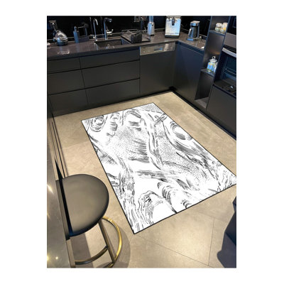 Tapis noir lavable à motif tissé pastel