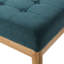 Élégant banc bleu sarcelle, revêtu d'un tissu de qualité et d'une structure texturée en bois de bouleau