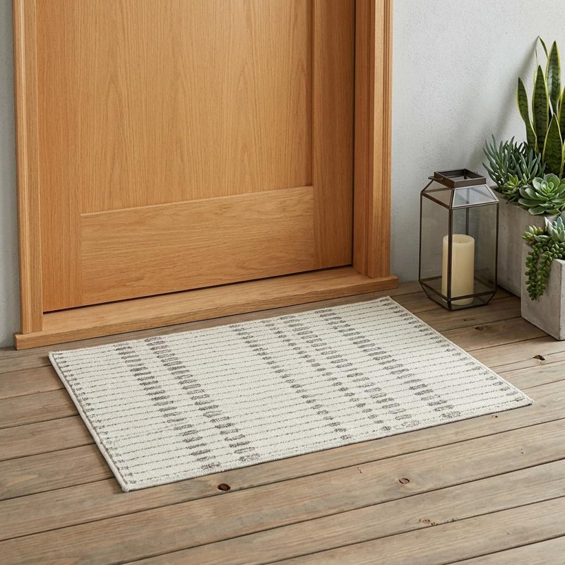3' X 5' Cream and Beige Striped Distressed Indoor Outdoor Area Rug