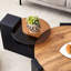 Table basse ronde à double couche avec plateau en verre transparent et pieds noirs, pieds de soutien robustes et brun