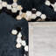 Tapis noir en viscose / cuir / coton touffeté à la main Jarrell-1298212345