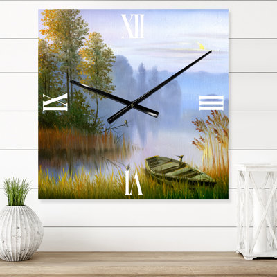 Horloge murale Le bateau sur la berge du lac
