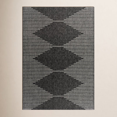 Abdulazeez Black Geometric Outdoor Rug
