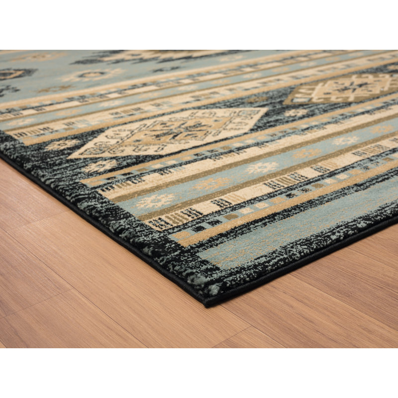 Tapis bleu / noir / beige en polypropylène tissé à la machine Southwestern, Rectangle 1 pi 10 po x 3 pi