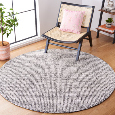 Rowe Handmade Tufted Ivory/Black Area Rug