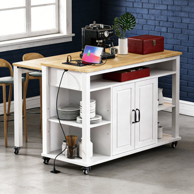 Îlot de cuisine de 47 pouces avec table de salle à manger extensible, rangement, prise de courant et tablettes réglables pour les cuisines modernes.